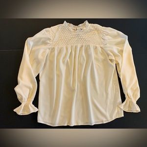 A New Day white dressy blouse.